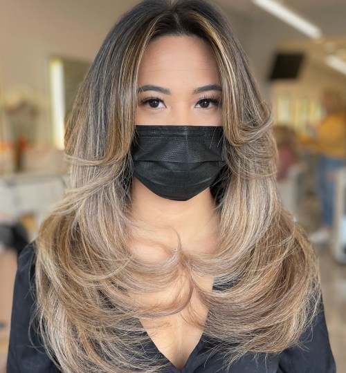 Long Feathered Curtain Bangs and Front Layered