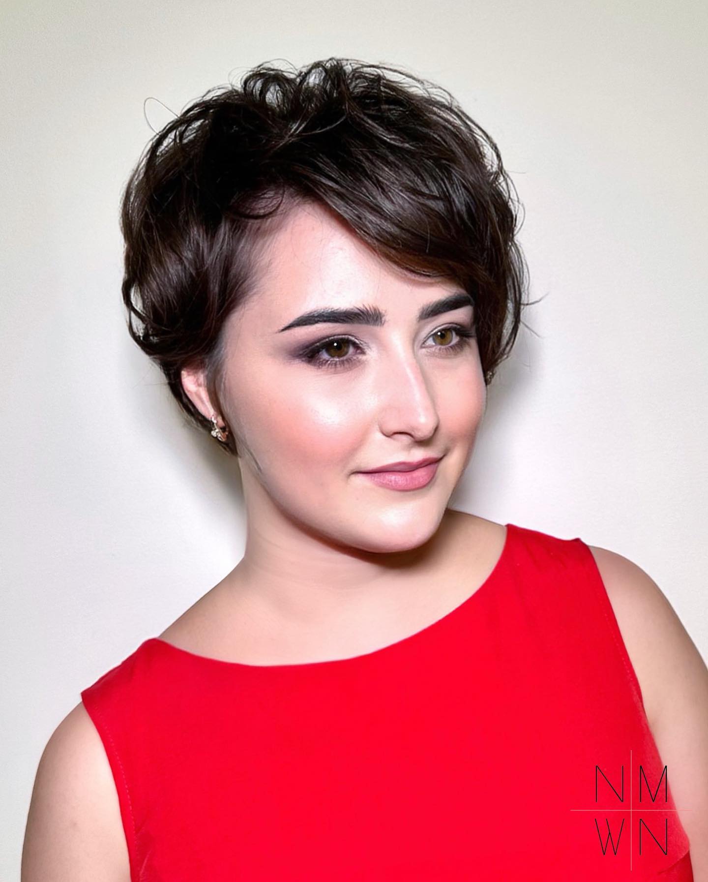 Tousled Pixie Haircut with Long Side Bangs