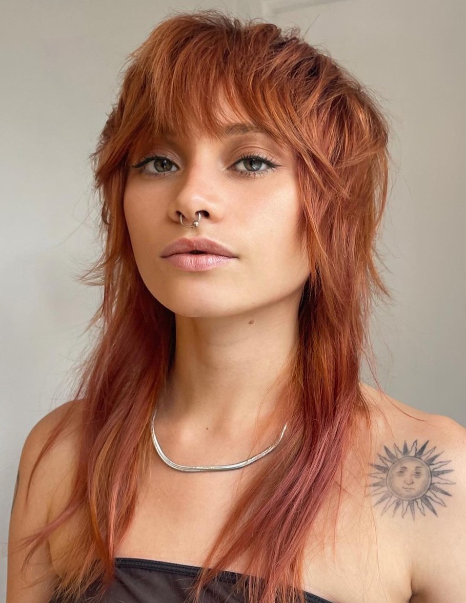 Bold Copper Haircut with Choppy Bangs