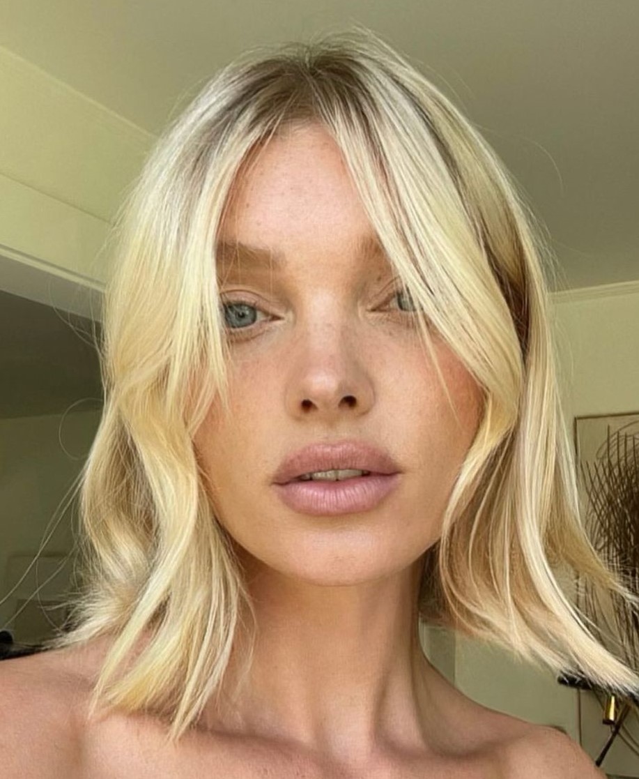 Bright Blonde Wavy Lob with Curtain Bangs