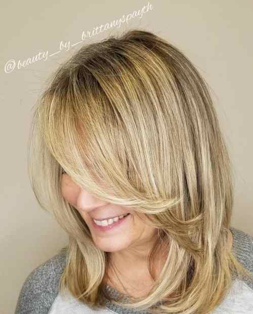 Medium Feathered Blonde Cut