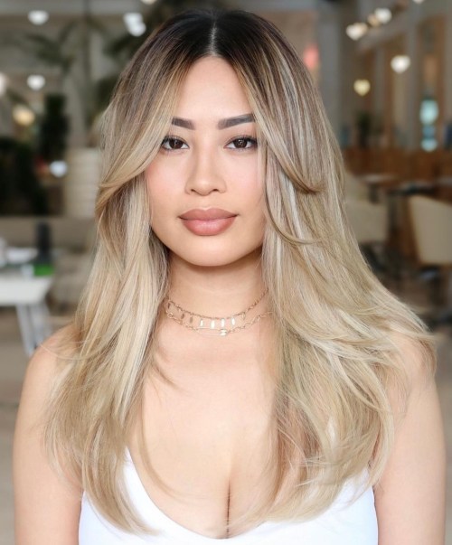 Long Straight Hair with Chin Length Bangs and Blonde Balayage
