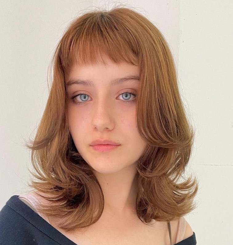 Shoulder Length Layered Cut with Short Bangs