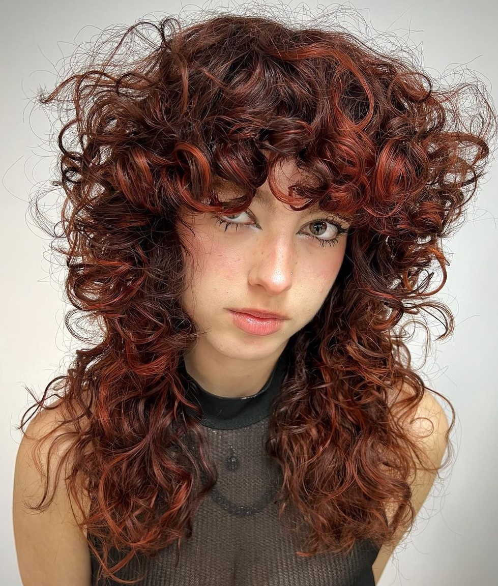 Heavily Layered Curly Red Hairstyle