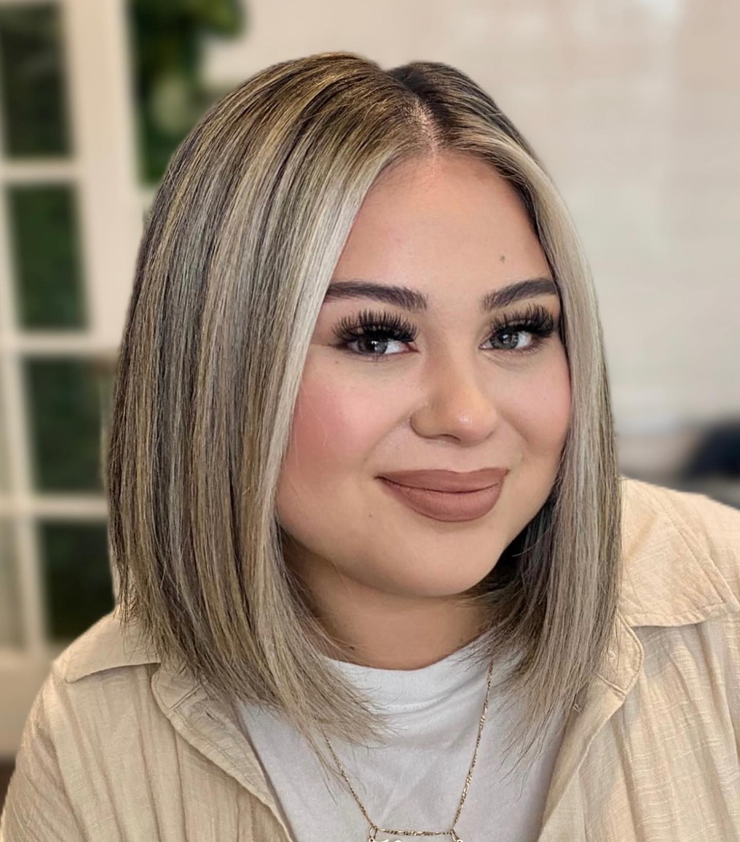 Sleek Shoulder-Length Bob for Round Faces