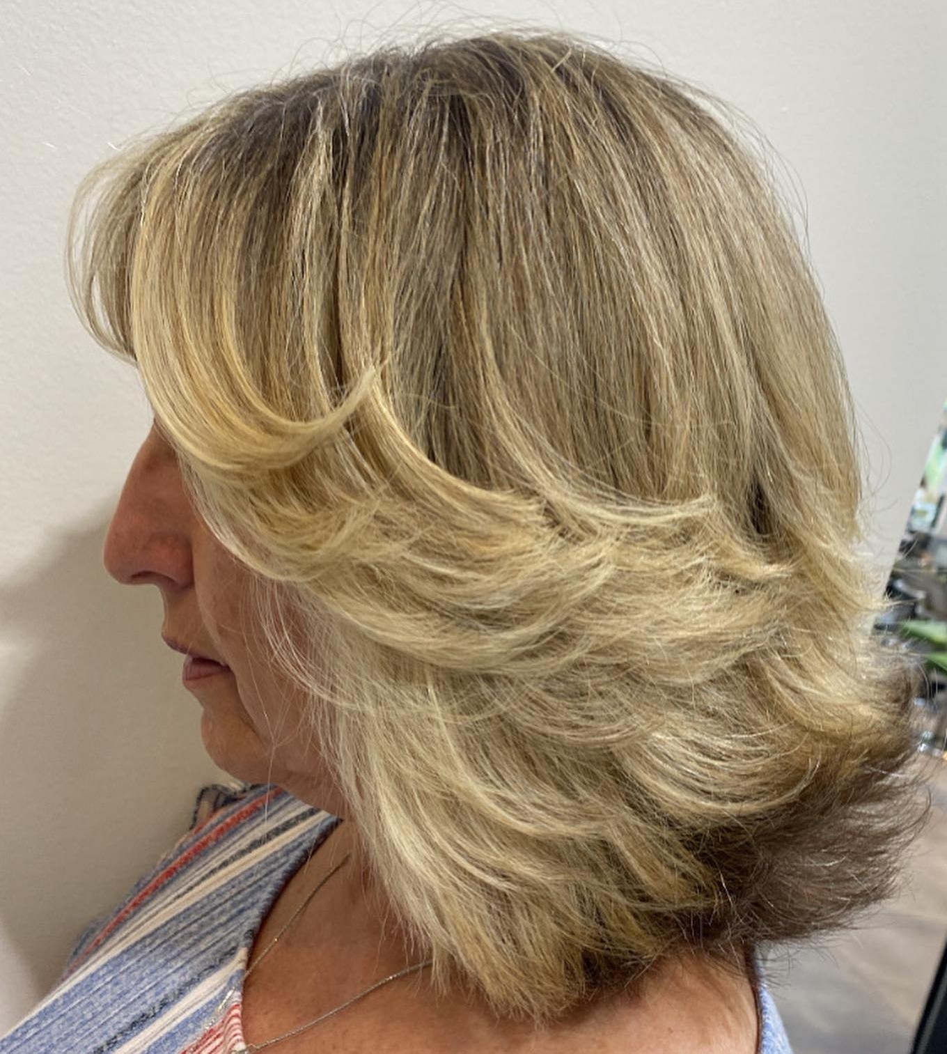 Over Medium Feathered Haircut