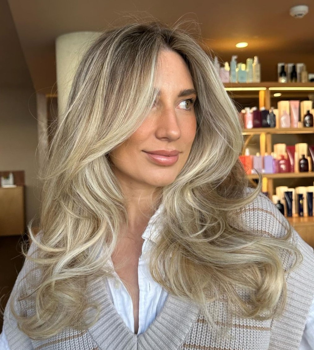 Buttery Blonde Layered Hairstyle Soft Butterfly Cut with Blonde Balayage