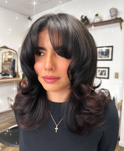 Curtain Bangs Curled Toward The Face