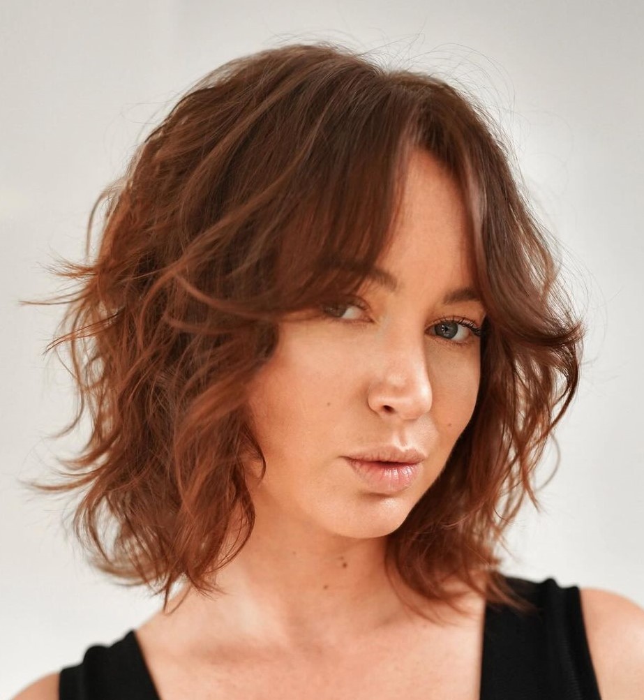 Choppy Bob with Curtain Bangs Reddish Brown Hair with Framing Fringe