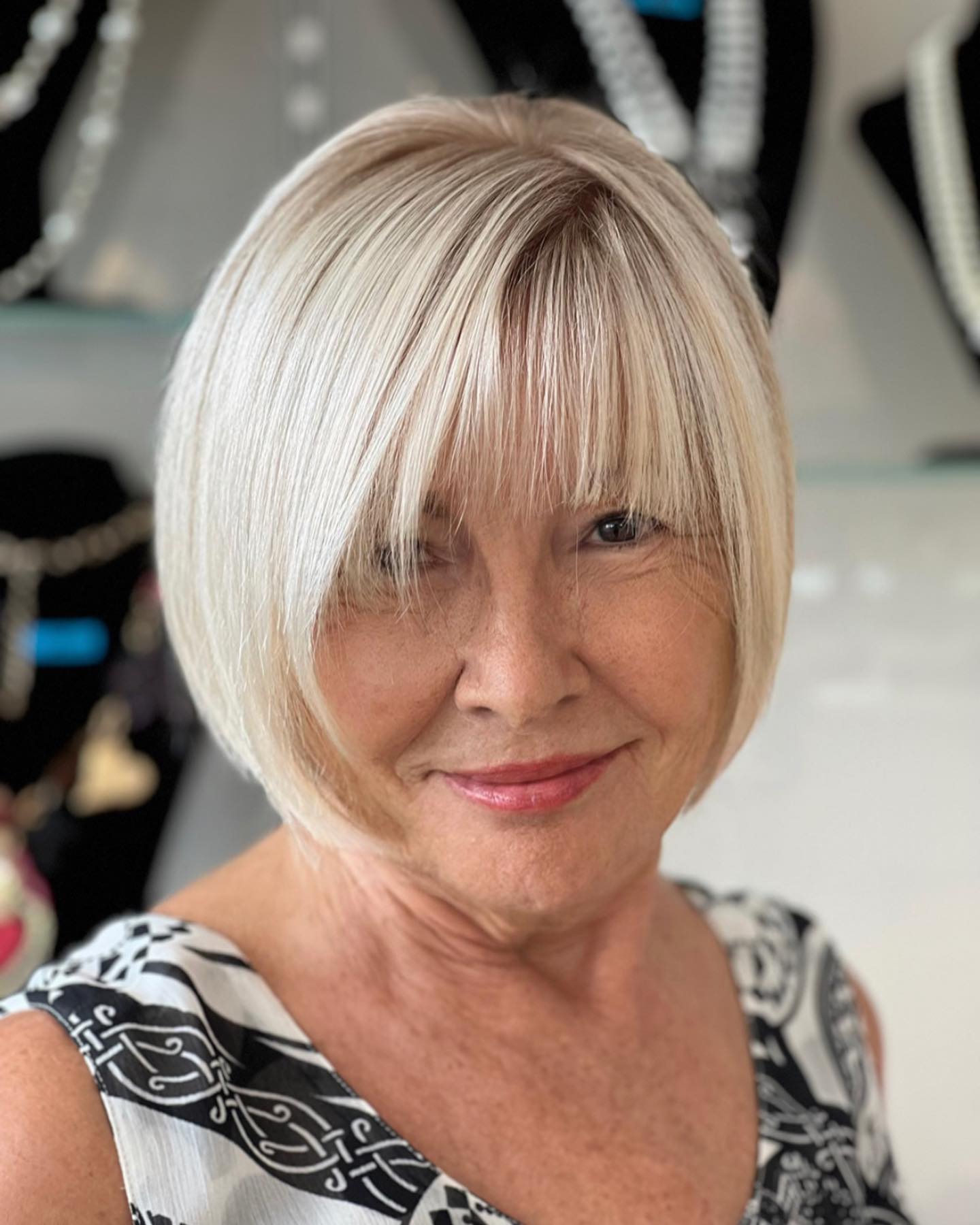 Sleek Bob with Bangs for Women over with Thin Hair